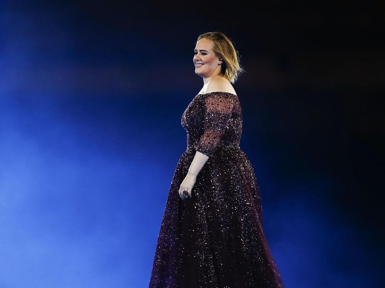 Takut Cuaca Pengaruhi Suaranya, Adele Tunda Konser Takut Cuaca Pengaruhi Suaranya, Adele Tunda Konser