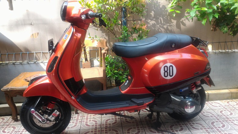 Vespa LX 150 Juicy Orange Vespa LX 150 Juicy Orange