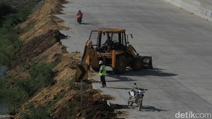 Ilustrasi Pembangunan Jalan Tol (Foto: Wisma Putra) Ilustrasi Pembangunan Jalan Tol (Foto: Wisma Putra)