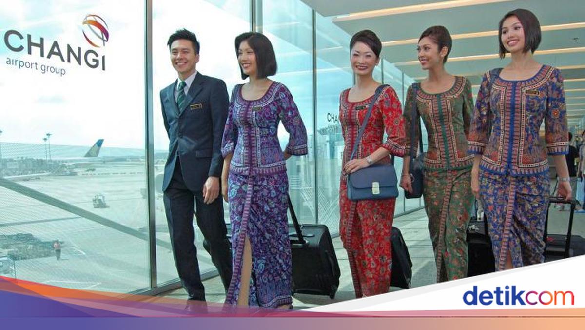 Video viral gadis kecil Kiarrah berpakaian pramugari Singapore Airlines mencuri perhatian penumpang. Momen spesial saat liburan keluarga yang menggemaskan!