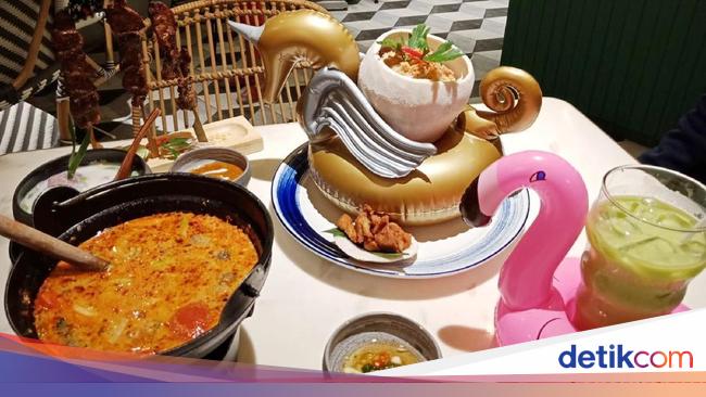 Santhai Bersantai Siang Ini dengan Nasi Goreng Kelapa Santhai Bersantai Siang Ini dengan Nasi Goreng Kelapa
