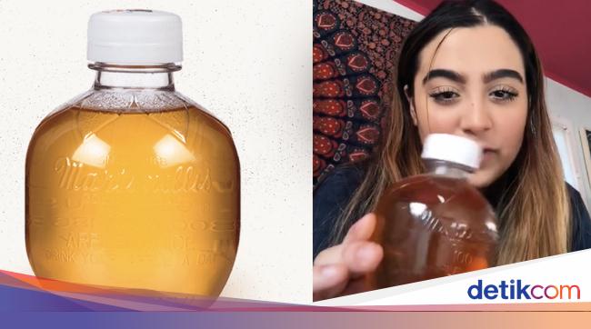 Tren Baru Di Tiktok Gigit Botol Jus Apel Yang Keluarkan Bunyi Renyah