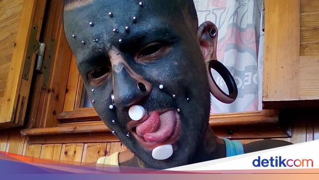 Foto Pria dengan Penampilan Menyeramkan yang Modifikasi Foto Pria dengan Penampilan Menyeramkan yang Modifikasi