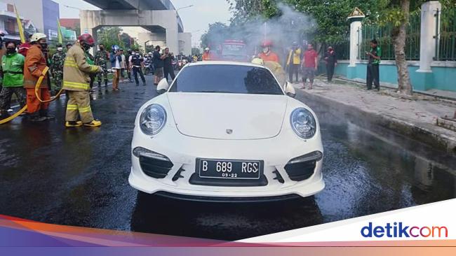 White Porsche on fire in Kelapa Gading