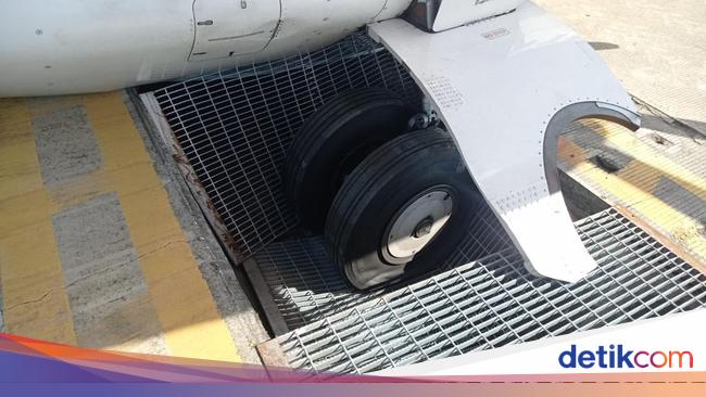 Roda Pesawat Wings Air Terperosok ke Drainase Bandara Ngurah Rai