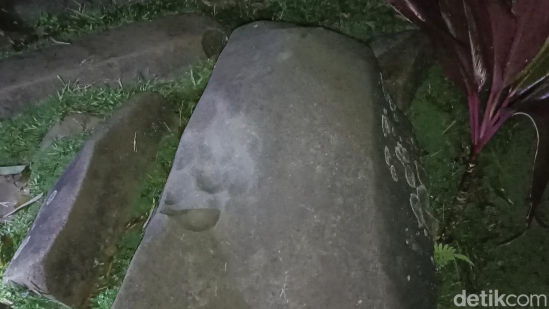 Penjaga Batu Besar Muara Pinang: Sebuah Misteri Gerimis