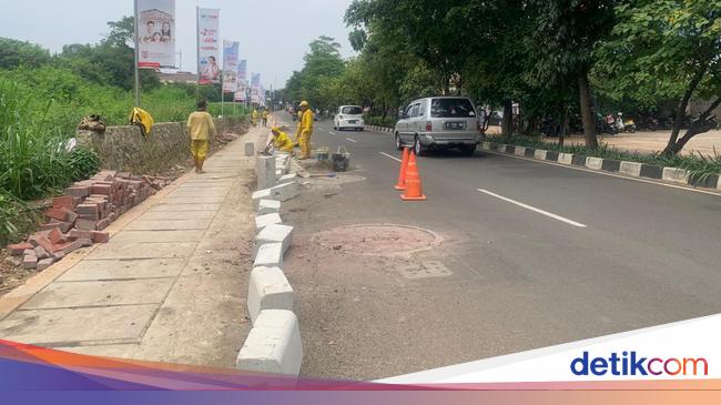 warga-sejak-ada-sodetan-sumur-resapan-jl-karang-tengah-tak-banjir-lagi