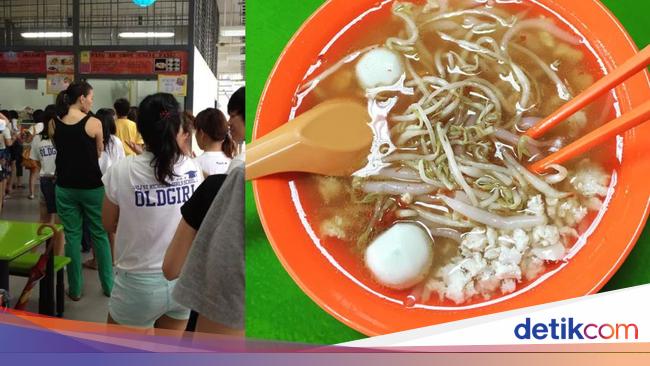 Customers queue for hours before the legendary noodle shop closes