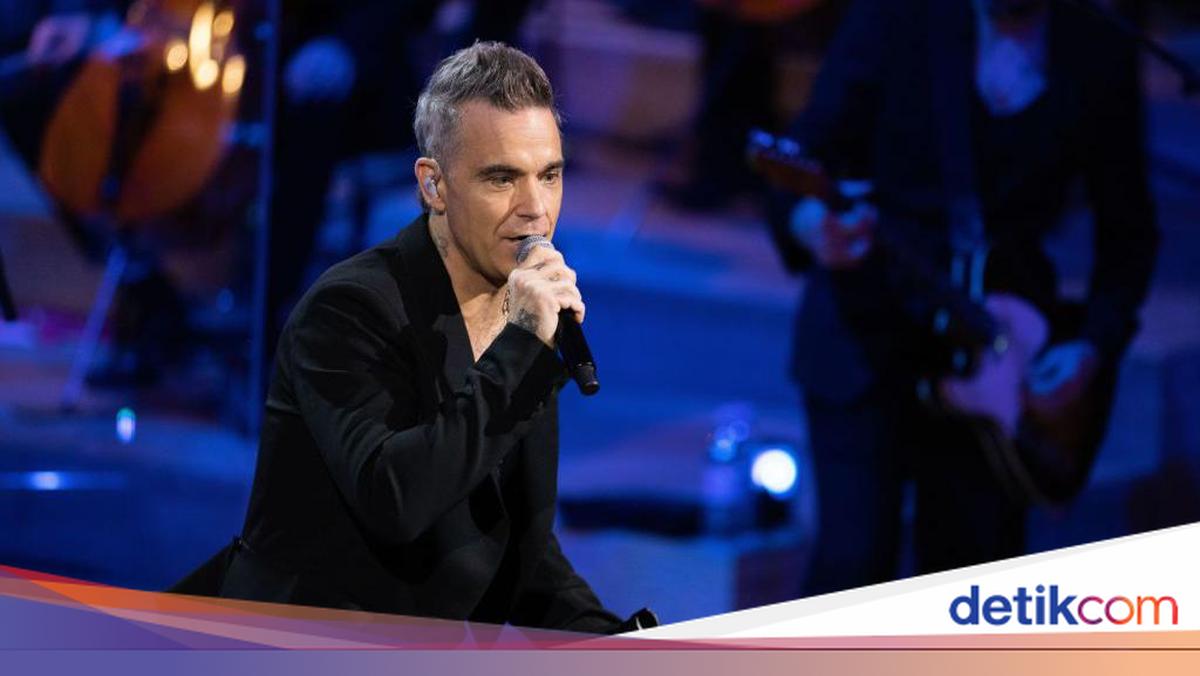 Heboh Benda Putih Jatuh dari Mulut Robbie Williams saat Tampil di Piala Dunia 2026 - detikcom - News Directory 3