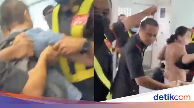 AirAsia Overbooked, Handwritten Tickets – Passengers being dragged out