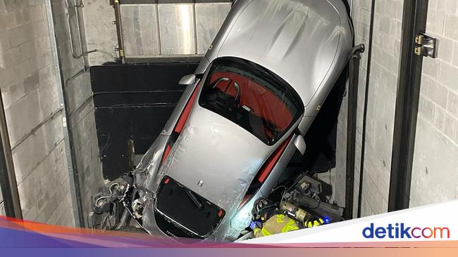 Hurts!  The Ferrari was wrecked because the elevator in the showroom was damaged