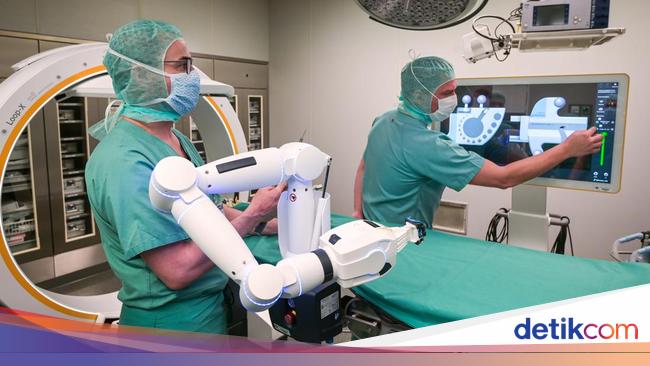 Dokter menggunakan alat medis canggih di ruang operasi