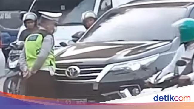 Arrogant Fortuner Driver’s Viral Behavior: Defies Police Authority by Stopping Instead of Persisting