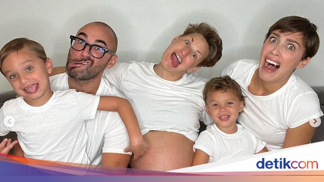 “Lesbian couple welcomes child through unique arrangement with ex-husband”