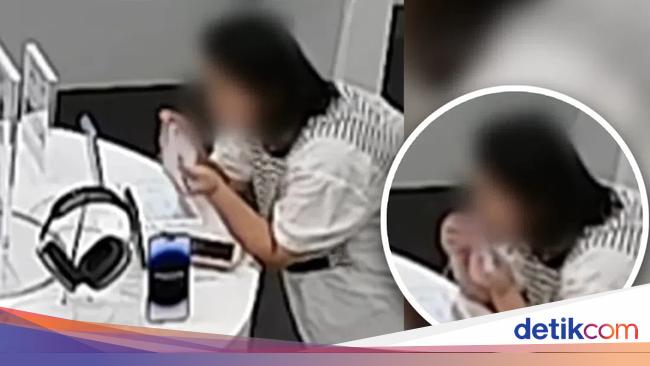 Bizarre Theft: Chinese Woman Bites iPhone 14 Plus Cable to Steal in a Shop