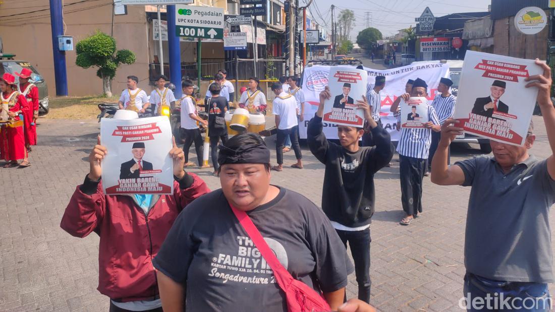 Relawan Ganjar Gelar Musik Patrol Dekat Acara Mlaku Bareng AMIN Di Sidoarjo