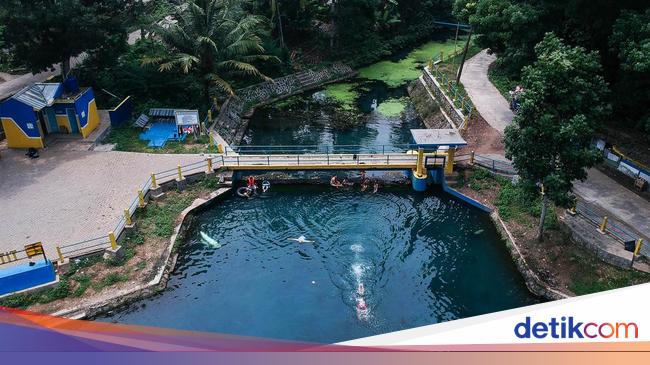 Serunya Bermain Air di Danau Biru Cibanten