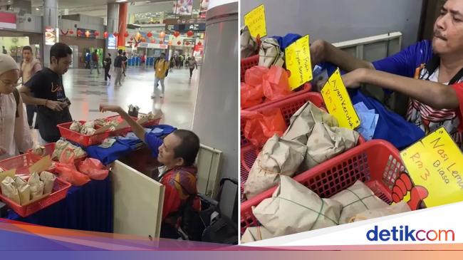 Pria Penyandang Disabilitas Gigih Jualan Nasi Lemak Pakai Kursi Roda