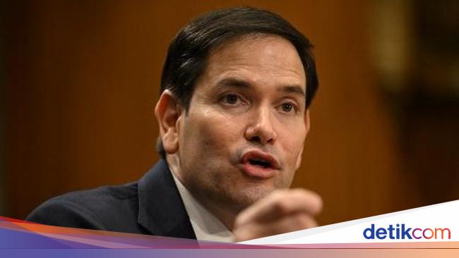 Usai Keluar dari WHO, AS Kini Bekukan Hampir Semua Bantuan Luar Negeri