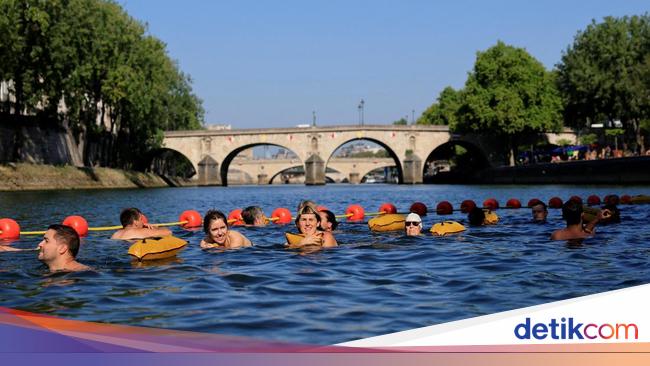Hobi Baru di Tengah Panasnya Paris, Berenang di Sungai Seine