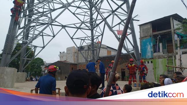 Bertahan 46 Menit, Pria di Jakut Akhirnya Turun Sendiri dari Tower SUTET
