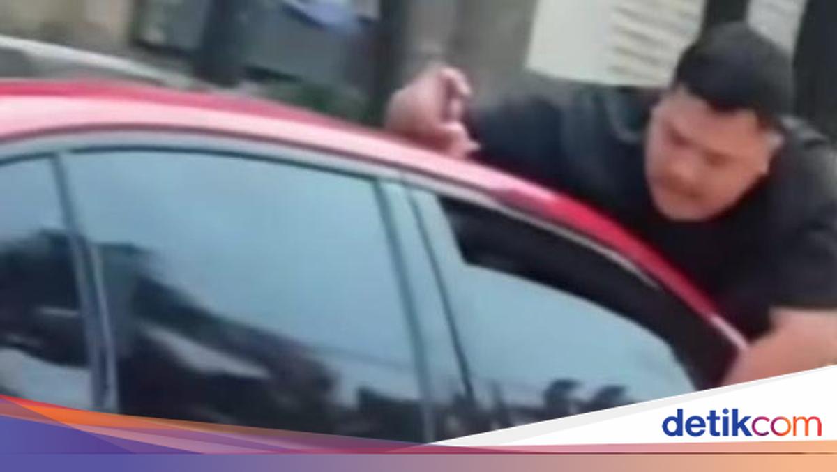 Viral Pria 'Nemplok' di Mobil Diduga Masalah Keluarga, Polisi Siap Mediasi
