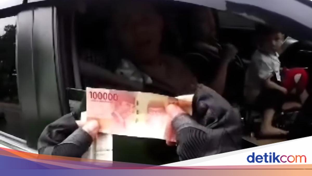 Salut! Polantas Ini Tolak Suap Pemobil Pakai Nopol Palsu di Puncak Bogor