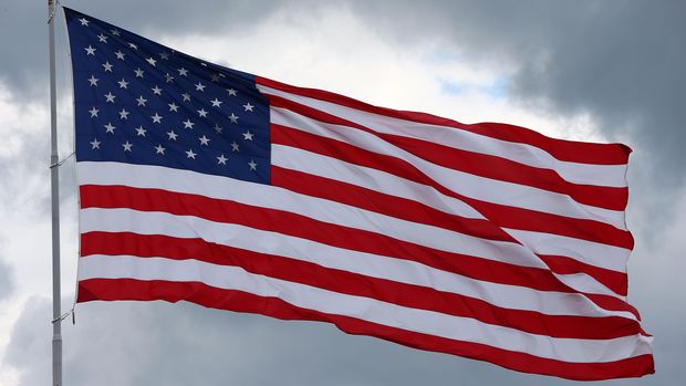   A giant American Flag waves above the track during the NASCAR Sprint Cup Series Aaron's 499 at Talladega Superspeedway on May 5, 2013 in Talladega, Alabama.  (Photo by Tom Pennington/Getty Images)