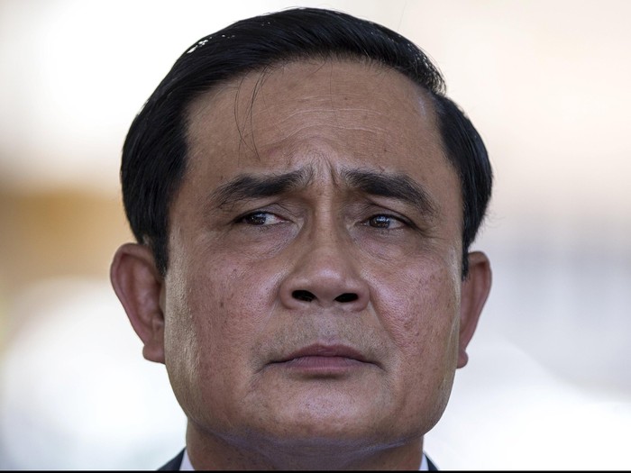 Thailands Prime Minister Prayuth Chan-ocha listens to a question from a journalist after a ceremony to mark the National Anti Human Trafficking Day at Government House in Bangkok, Thailand, June 5, 2015.   REUTERS/Athit Perawongmetha