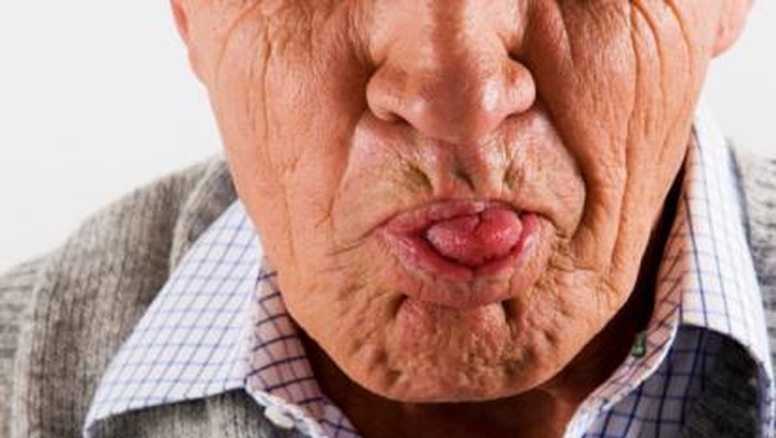 Senior Man Sticking out Tongue