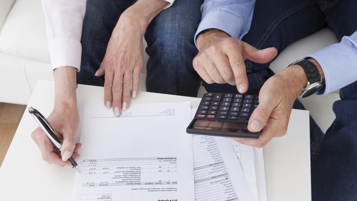 Close-up of couple doing finances at home