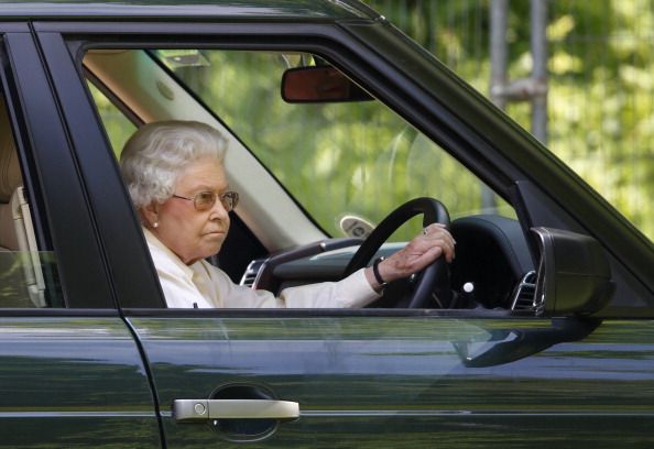 WINDSOR, UNITED KINGDOM - MAY 17: (EMBARGOED FOR PUBLICATION IN UK NEWSPAPERS UNTIL 48 HOURS AFTER CREATE DATE AND TIME) Queen Elizabeth II drives her Range Rover car as she watches the International Carriage Driving Grand Prix event on day 4 of the Royal Windsor Horse Show at Home Park on May 17, 2014 in Windsor, England. (Photo by Max Mumby/Indigo/Getty Images)