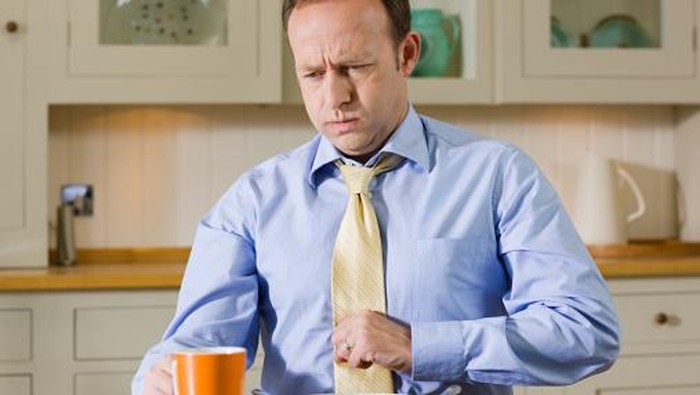 Man with indigestion