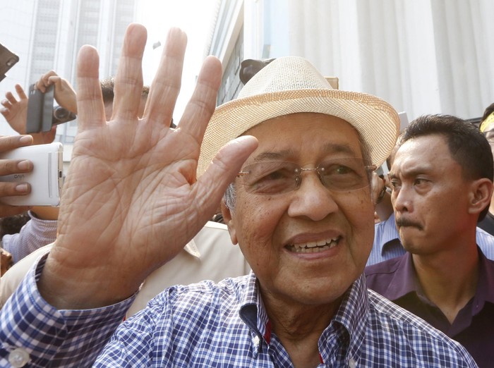 Former Malaysian Prime Minister Mahathir Mohamad speaks to the media during a rally organised by pro-democracy group 