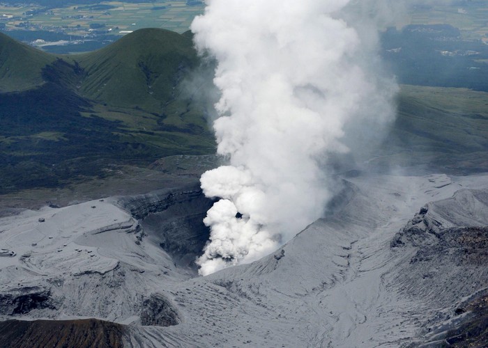 An aerial view shows an eruption of Mount Aso in Aso, Kumamoto prefecture, southwestern Japan, in this photo taken by Kyodo September 14, 2015. Mount Aso, a volcano on Japans main southern island of Kyushu, erupted on Monday, Japans Meteorological Agency said, blasting a plume of black smoke 2 km (1.2 miles) high, but there were no immediate reports of damage or injuries. Mandatory credit. REUTERS/KyodoATTENTION EDITORS - THIS PICTURE WAS PROVIDED BY A THIRD PARTY. REUTERS IS UNABLE TO INDEPENDENTLY VERIFY THE AUTHENTICITY, CONTENT, LOCATION OR DATE OF THIS IMAGE. FOR EDITORIAL USE ONLY. NOT FOR SALE FOR MARKETING OR ADVERTISING CAMPAIGNS. MANDATORY CREDIT. JAPAN OUT. NO COMMERCIAL OR EDITORIAL SALES IN JAPAN.  THIS IMAGE WAS PROCESSED BY REUTERS TO ENHANCE QUALITY, AN UNPROCESSED VERSION WILL BE PROVIDED SEPARATELY.      TPX IMAGES OF THE DAY