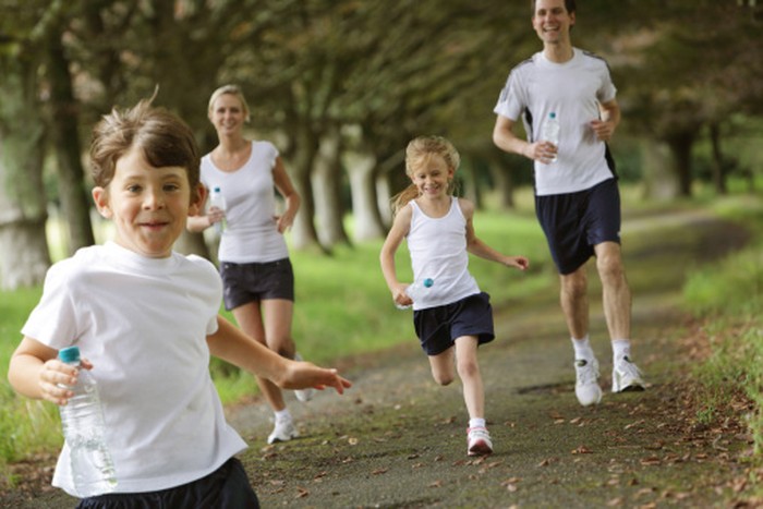 Family jogging in park