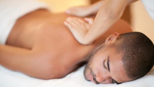 Man receiving back massage.
