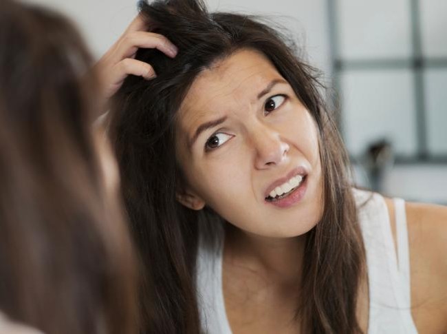 Woman having a bad hair day
