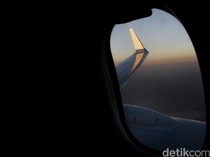Penumpang Pesawat Jengkel Orang di Sebelahnya Memotret Langit Tanpa Henti