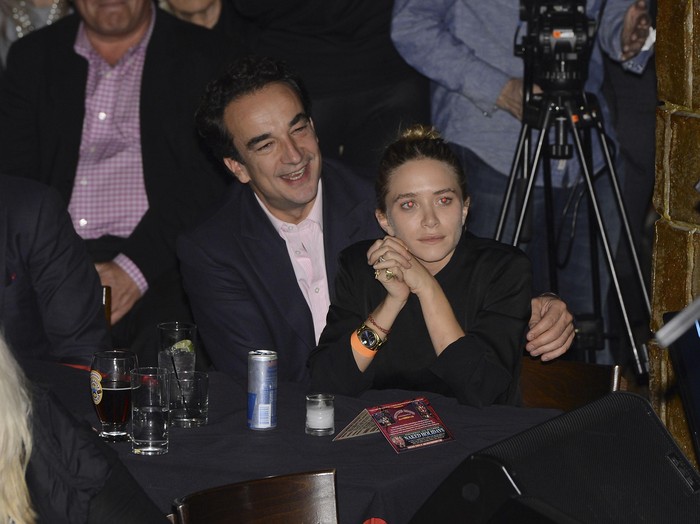 NEW YORK, NY - NOVEMBER 07:  Olivier Sarkosy and Mary Kate Olsen attend performance of Ronnie Wood And Mick Taylor With Special Guests at The Cutting Room on November 7, 2013 in New York City.  Ronnie Wood of the Rolling Stones made a rare club appearance at New York?s premiere music venue and nightclub, The Cutting Room.  Ronnie was performing the music of Jimmy Reed.  Musical icons  Mick Taylor, Al Cooper, Simon Kirk, Gary Clark Jr. and others joined him on stage.  (Photo by Larry Busacca/Getty Images)