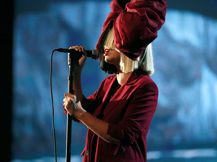 Sia LOS ANGELES, CA - NOVEMBER 18: Recording artist Sia performs onstage at A+E Networks