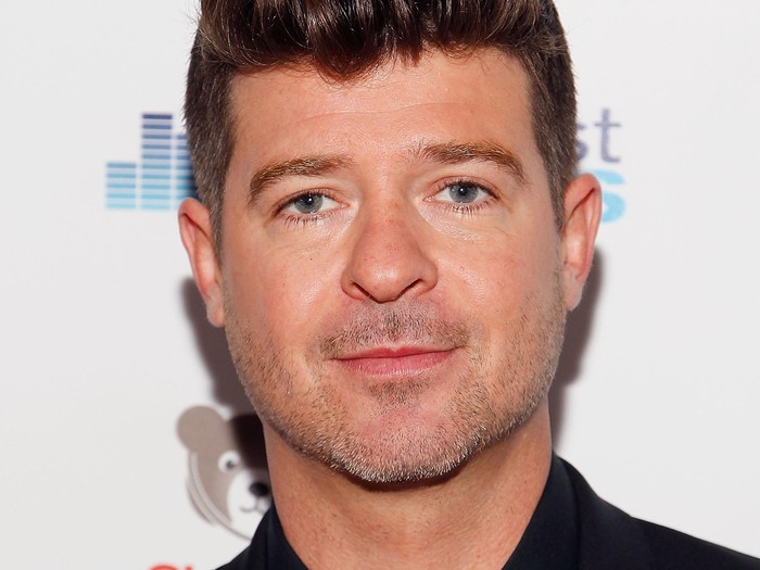 WASHINGTON, DC - NOVEMBER 06:  Singer/songwriter Robin Thicke arrives for the grand opening of the new state-of-the-art Secrest Studios at Childrens National Health System on November 6, 2015 in Washington, DC. The studio will broadcast entertainment programming throughout the hospital and provide a creative, interactive experience for patients.  (Photo by Paul Morigi/Getty Images for Childrens National Health System)