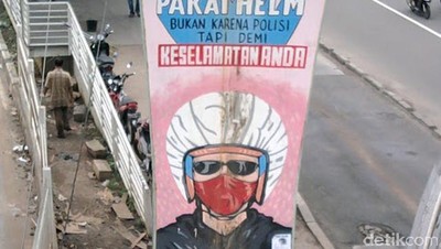 Pakai Helm Bukan Karena Ada Polisi