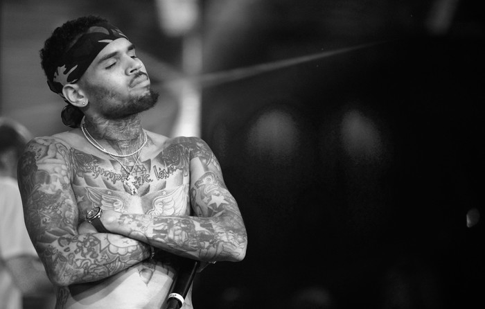 LAS VEGAS, NV - JANUARY 01:  (EDITORS NOTE: Image has been digitally converted to black and white.) Singer Chris Brown performs at Drais Beachclub - Nightclub at the Cromwell Las Vegas kicking off Drais LIVE 2016 on January 1, 2016 in Las Vegas, Nevada.  (Photo by Bryan Steffy/Getty Images for Drais Beachclub-Nightclub)