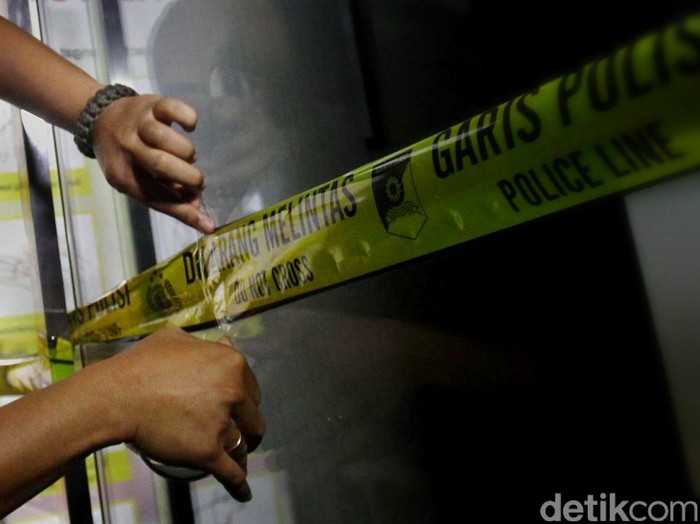 Garis polisi dilarang melintas..Grandyos Zafna//ilustrasi/detikcom