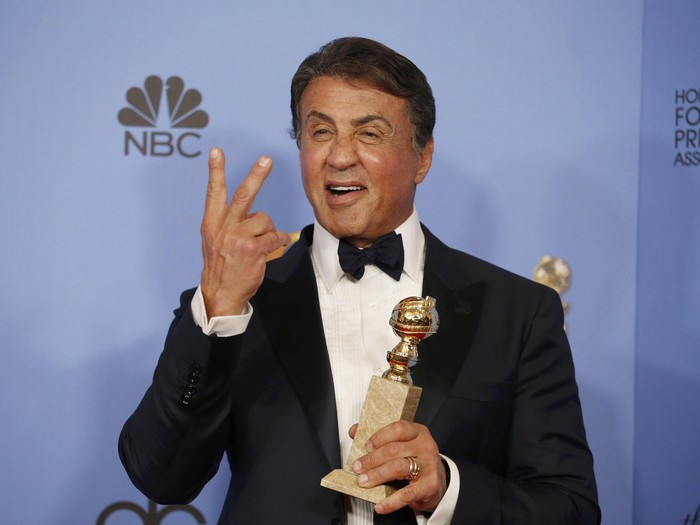 Sylvester Stallone poses backstage with the award for Best Performance by an Actor in a Supporting Role in any Motion Picture for his role in Creed at the 73rd Golden Globe Awards in Beverly Hills, California January 10, 2016.  REUTERS/Lucy Nicholson