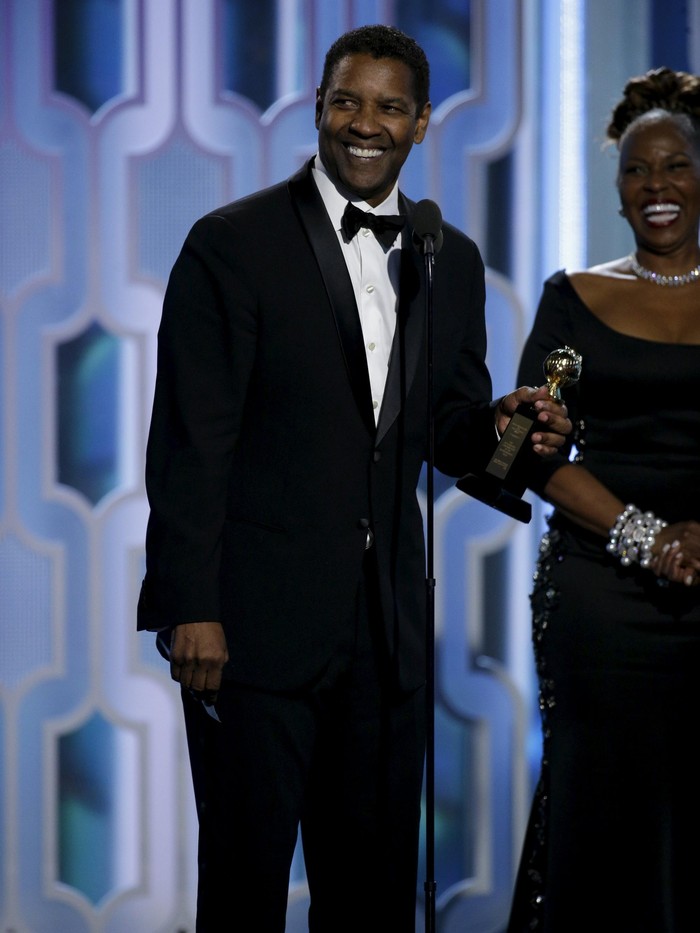 Denzel Washington Denzel Washington (L) and his wife react on stage after Washington won the Cecil B. Demille Award at the 73rd Golden Globe Awards in Beverly Hills, California January 10, 2016. REUTERS/Paul Drinkwater/NBC Universal/Handout For editorial use only. Additional clearance required for commercial or promotional use. Contact your local office for assistance. Any commercial or promotional use of NBCUniversal content requires NBCUniversals prior written consent. No book publishing without prior approval.