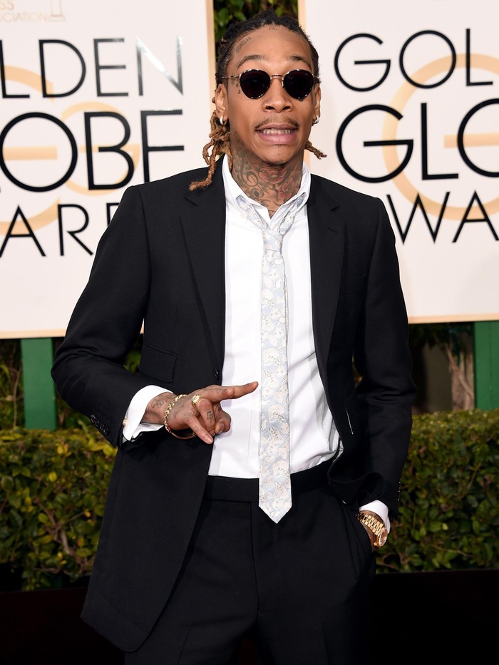 Wiz Khalifa BEVERLY HILLS, CA - JANUARY 10: Rapper Wiz Khalifa attends the 73rd Annual Golden Globe Awards held at the Beverly Hilton Hotel on January 10, 2016 in Beverly Hills, California. (Photo by Jason Merritt/Getty Images)