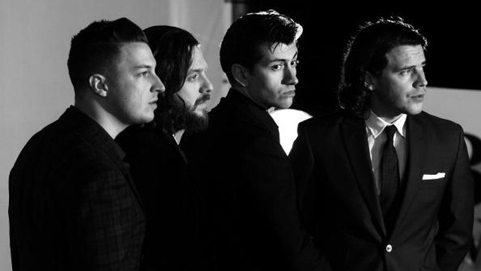 LONDON, ENGLAND - FEBRUARY 19:  (EDITORS NOTE: Image has been converted to black and white) (L-R) Matt Helders, Nick OMalley, singer Alex Turner and Jamie Cook of Arctic Monkeys attend The BRIT Awards 2014 at 02 Arena on February 19, 2014 in London, England.  (Photo by Dan Kitwood/Getty Images)