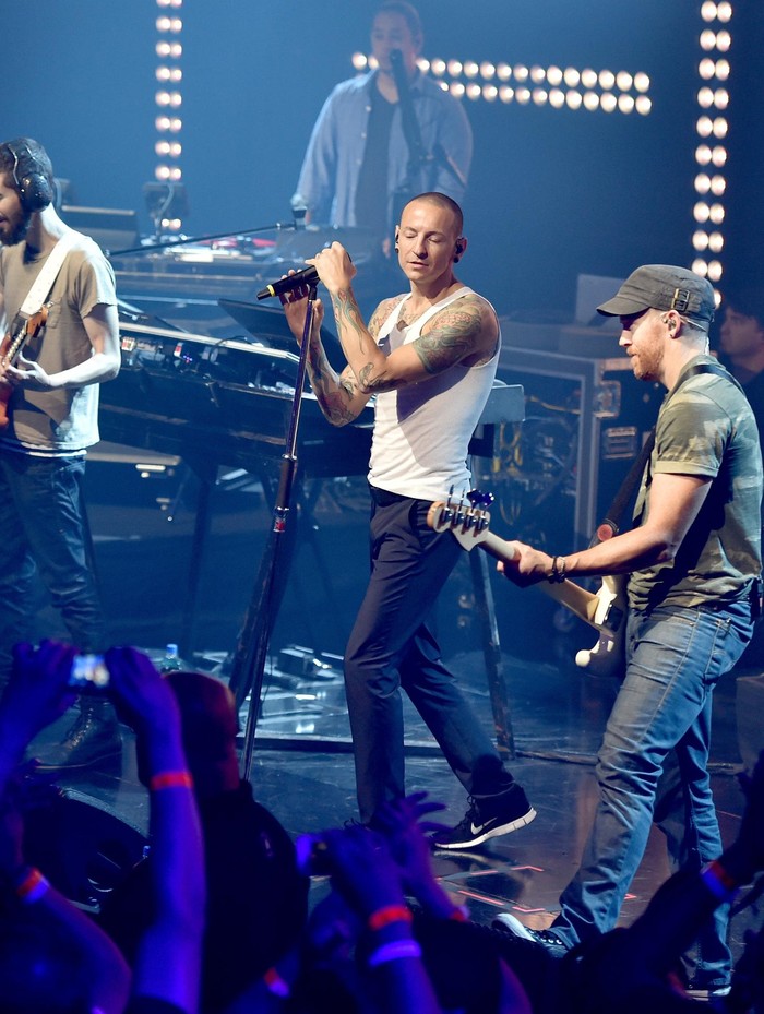 489363861PB00108_Linkin_Par BURBANK, CA - JUNE 18: Musical group Linkin Park onstage during the iHeartRadio album release party with Linkin Park presented by Clear Channel at the iHeartRadio Theater on June 18, 2014 in Burbank, California. (Photo by Kevin Winter/Getty Images for Clear Channel)